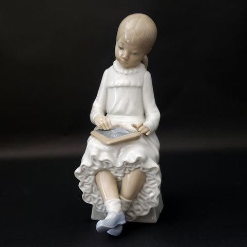 NAO by Lladro Porcelain Figurine "School Girl Writing on Chalkboard" #117 Spain