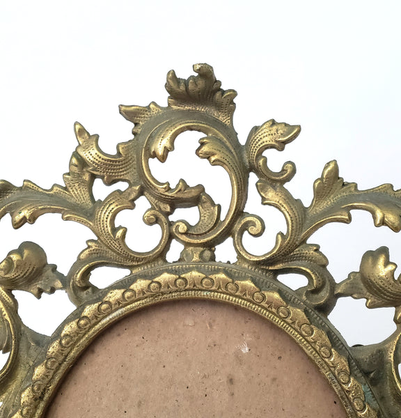 Vintage Ornate Oval Brass Frame with Fold Over Back Stand Rococo Flair