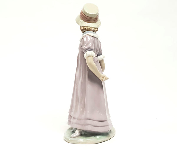 Girl With Toy Wagon, Retired Porcelain Figurine by Lladro 1978