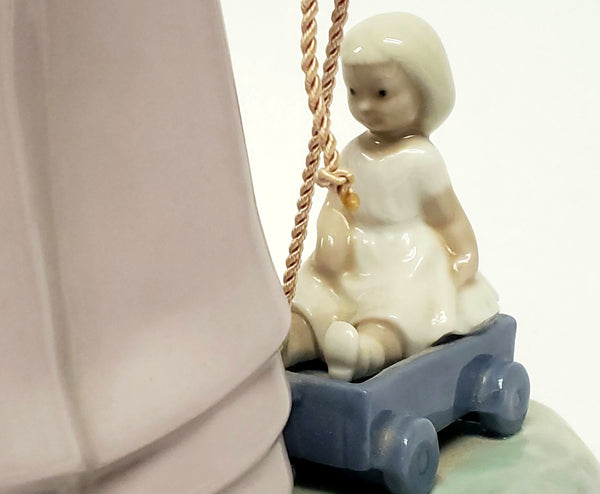 Girl With Toy Wagon, Retired Porcelain Figurine by Lladro 1978
