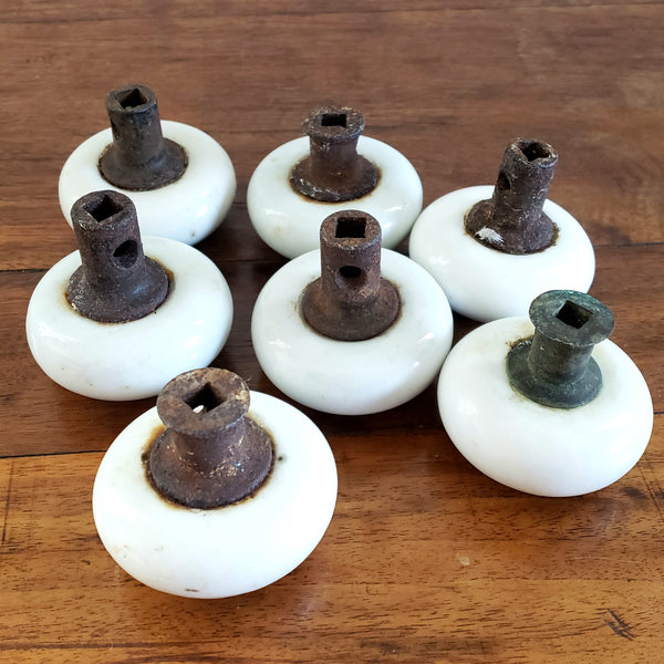 Antique 2 1/4" White Porcelain Door Knobs with Iron Shafts, Lot of 7